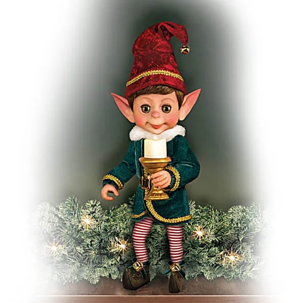 The Ashton-Drake Galleries Charlie Christmas Elf Collection Issue #1: 'Charlie Christmas Elf' Doll Handcrafted Holiday Elf with Light-Up Candle, Story Card, and Stocking Holiday Decorations by Ina Volprich 14-Inches