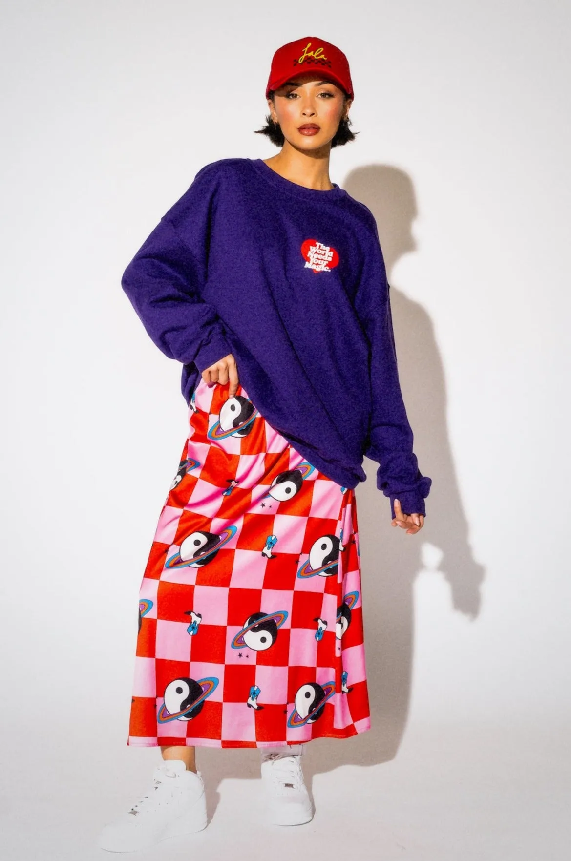 The World Needs Your Magic Heart Puff Print Pullover in Grape Soda